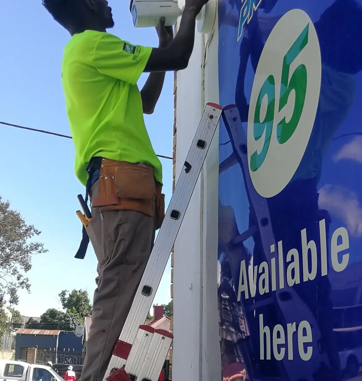 Securica technician installing security equipment on site