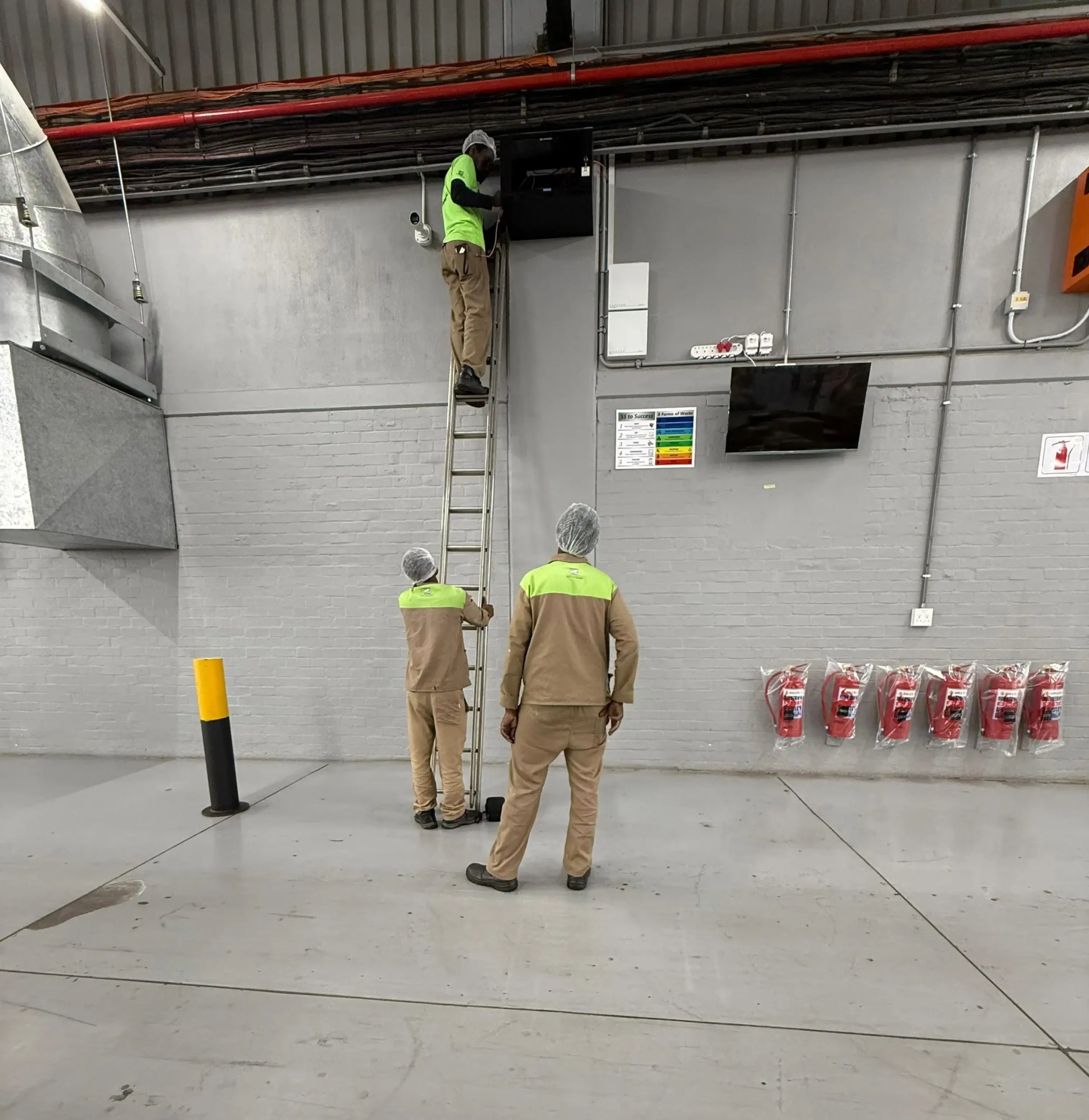 A Securica technician working on a client installation